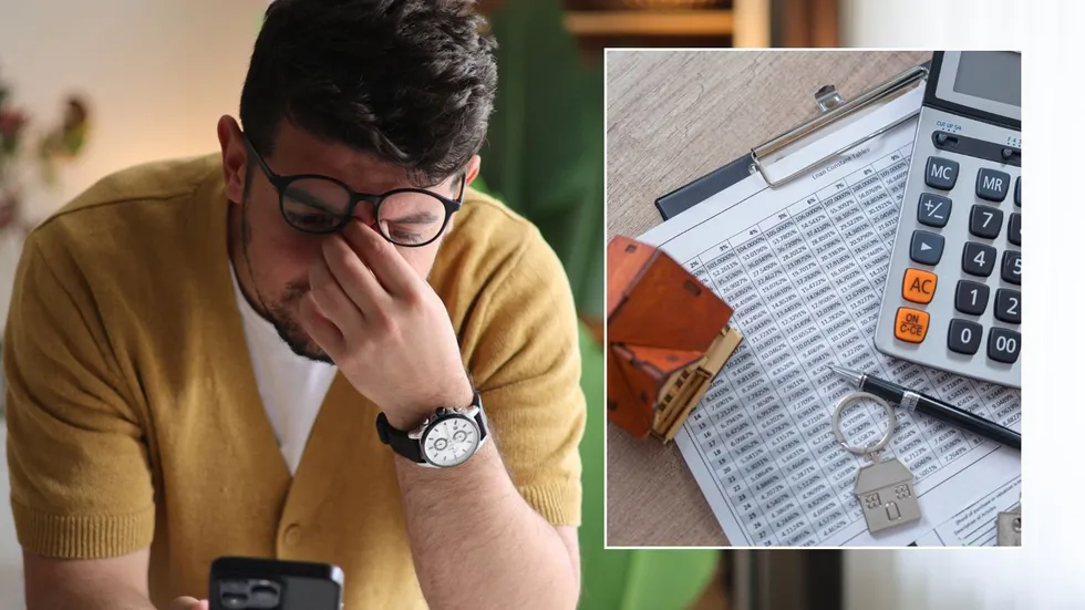 Man looking at phone and property tax form