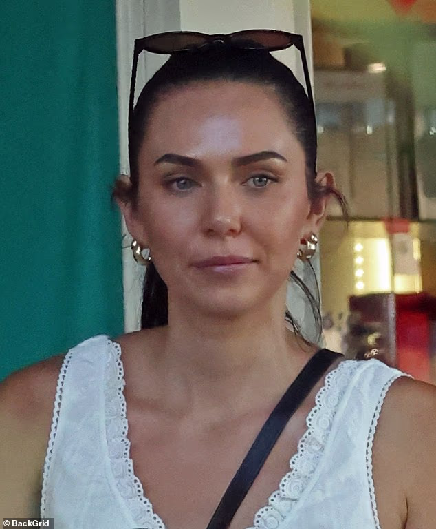 Tess Crosley, the woman at the centre of AFL star Lachie Neale's marriage breakdown with wife Jules, has been spotted packing removal boxes at her Brisbane home