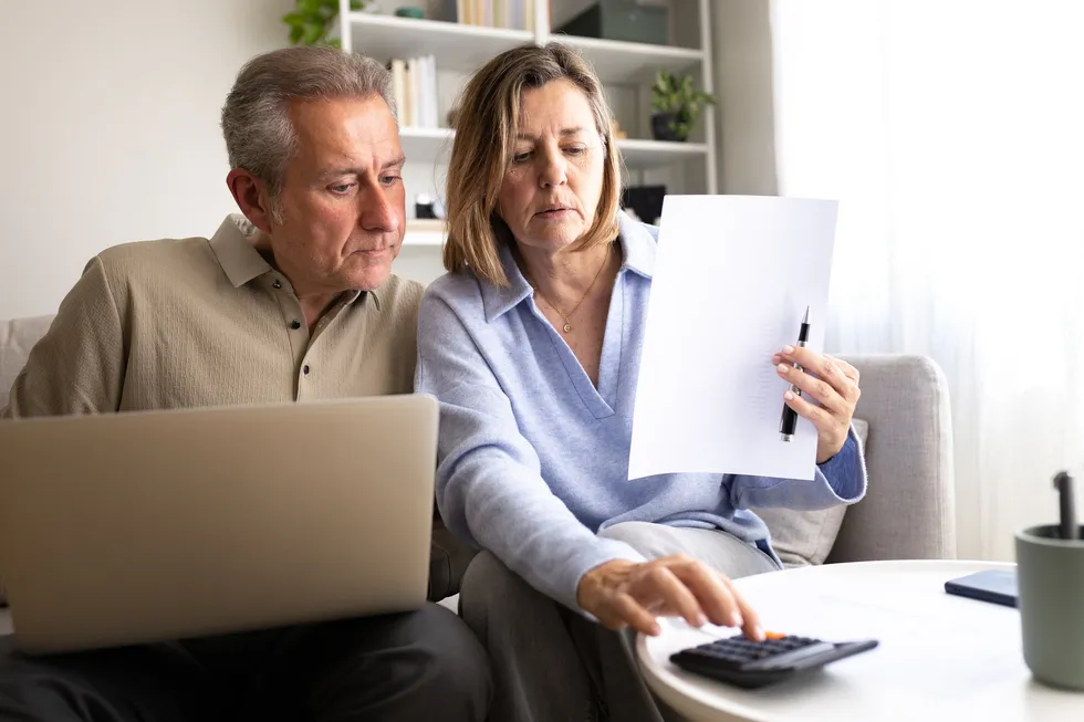 Couple with calculator