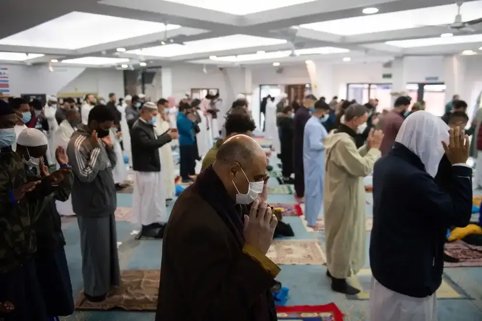 People praying in a mosque