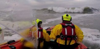 Brave RNLI crew battle terrifying storm to save stranded dog