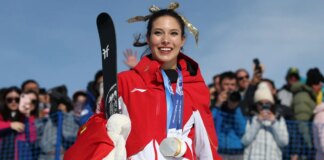 Eileen Gu wins gold at Winter Olympics amid ‘traitor’ controversy after switching allegiance from US to China