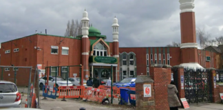 Urgent manhunt launched as men armed with axe and knife enter mosque during Ramadan prayers