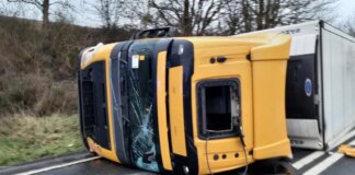 Overturned lorry prompts major road closure as emergency services deal with recovery and diesel spill