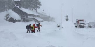 Californian avalanche: rescuers reach six stranded skiers, with nine still missing | US News
