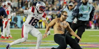 NFL showpiece suffers delay after pitch invader runs onto field and is tackled by Patriots player