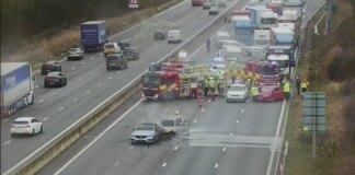 Multi-vehicle crash and serious car fire closes motorway as emergency services rush to scene