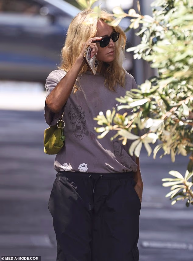 In another moment, she spoke on her phone while keeping her head down