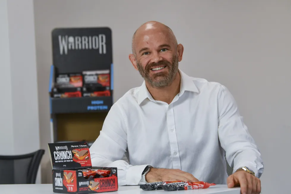 Kieran Fisher with Warrior products