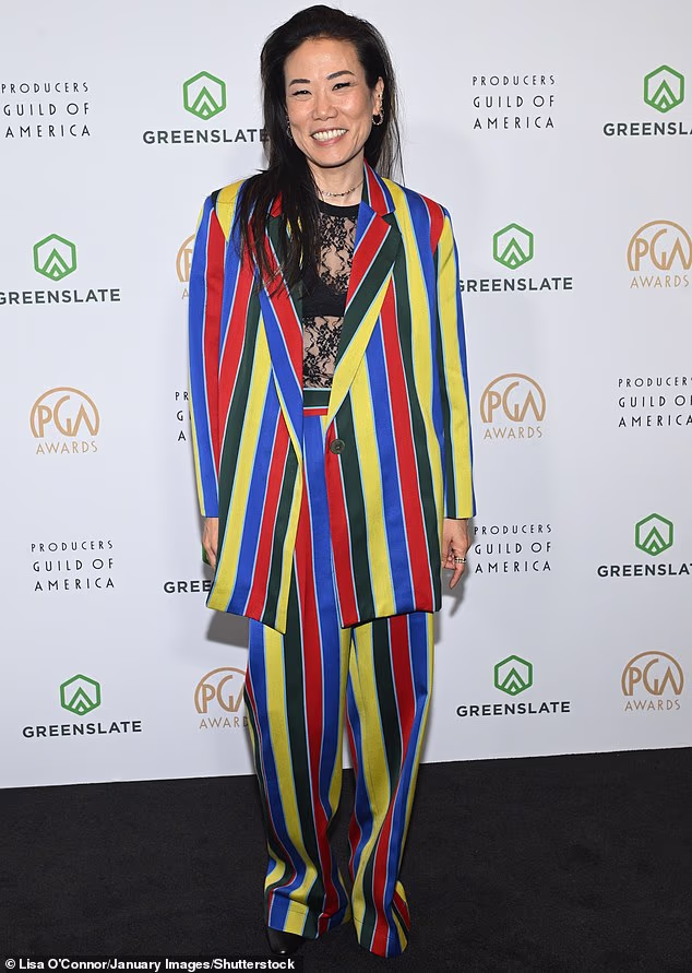 Miri Yoon made a statement wearing a colorful striped suit as well as a sheer black, lace top underneath