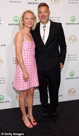 Screenwriter Zach Baylin was dapper with TV writer Kate Susman who was classy in a pastel pink minidress with sparkling silver embellishments