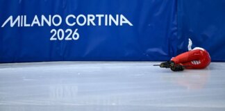 Winter Olympics star hides face after returning home following horror skating crash