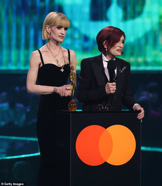 The former X factor judge told the crowd: 'I'm honoured to accept this award from my gorgeous husband, this Lifetime Achievement Award'