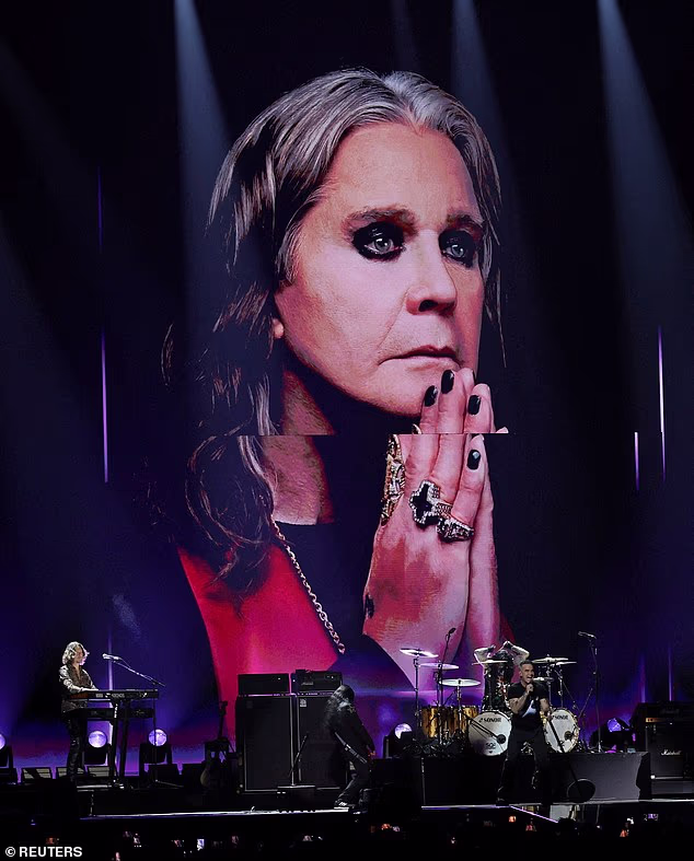 Huge pictures of the late Ozzy were shown onscreen behind Robbie as he performed
