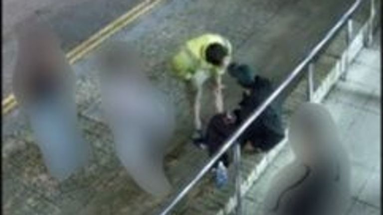 Chas Corrigan, 22, in a hi-vis jacket, approaching Mohammed Algasim, 20. Pic: Cambridgeshire Police/PA 