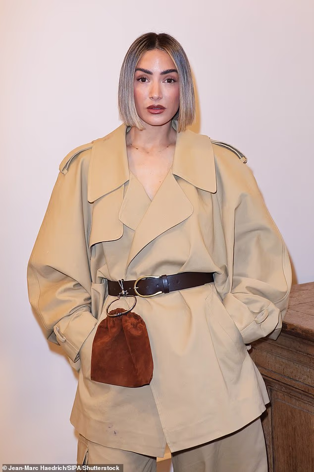 The Loose Women panellist, 37, cut an edge figure in an oversized beige suit which boasted a voluminous jacket and palazzo pants