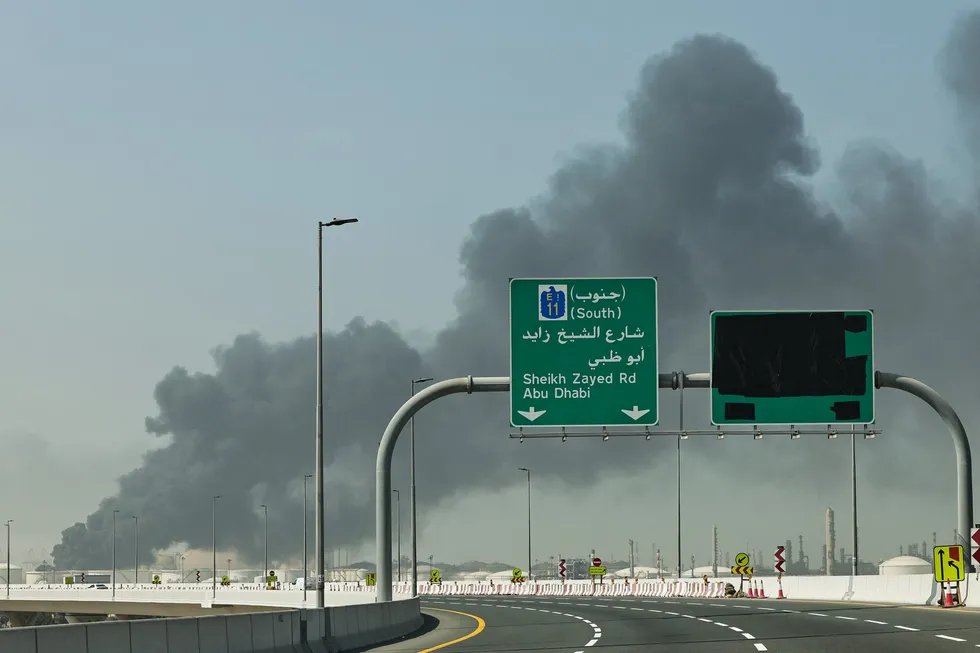 A plume of smoke rises from the port of Jebel Ali following a reported Iranian strike in Dubai