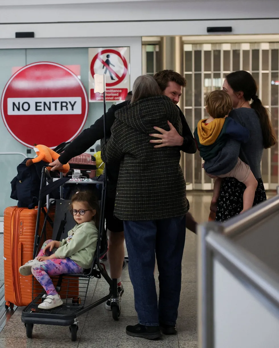 Britons at Stansted Airport after evacuation flight