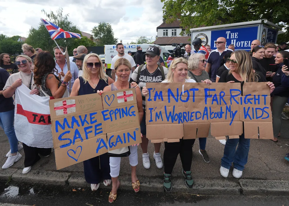 \u200bProtesters gathered outside of The Bell Hotel