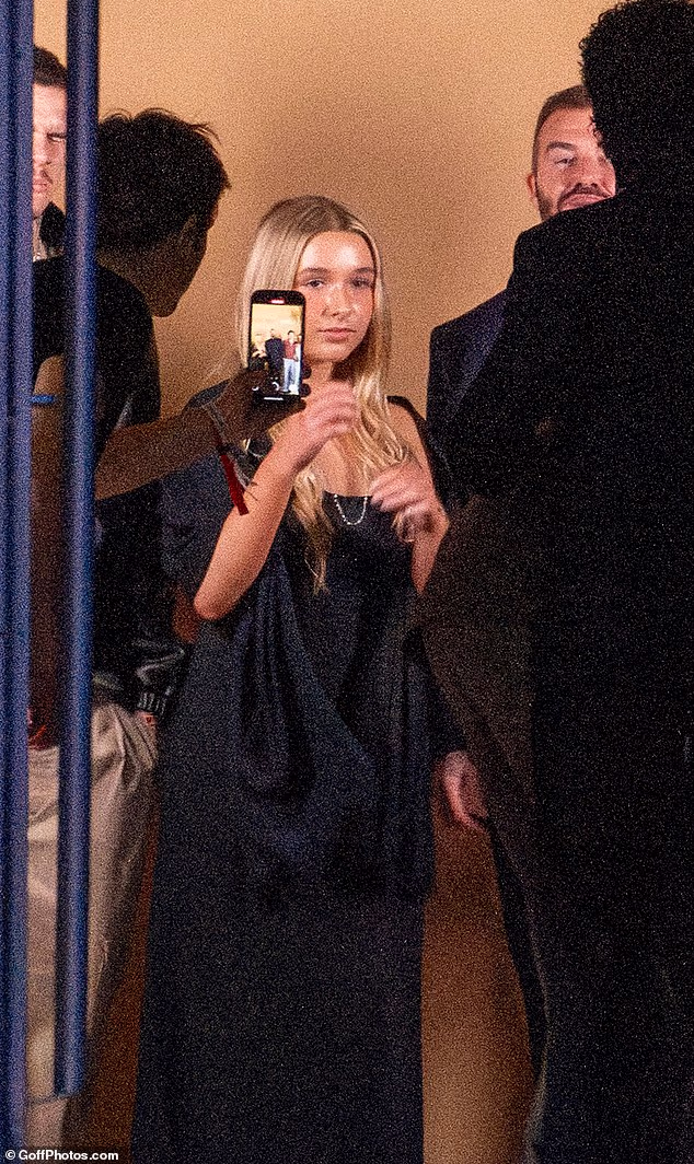 David and Victoria's only daughter Harper was seen wearing one of her mum's designs at the show