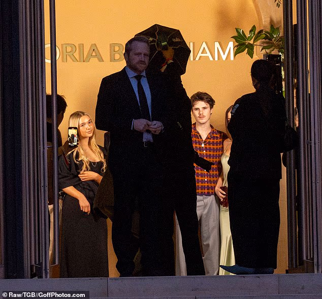 The family were seen posing for snaps together on arrival as they prepared to take their seats for the show