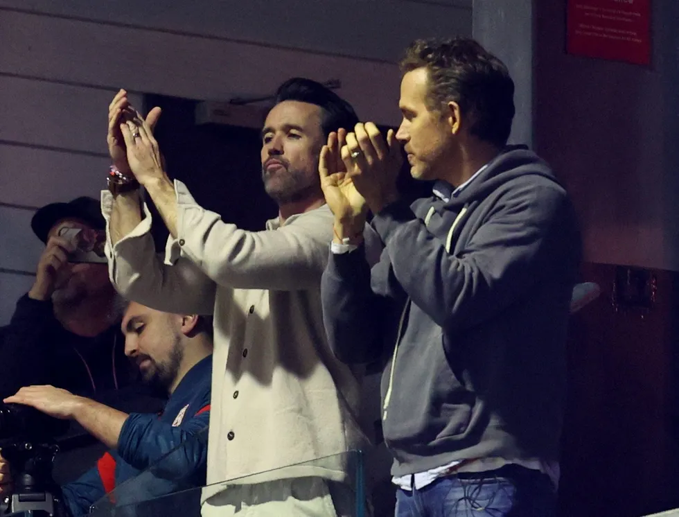 Wrexham's Hollywood owners Rob Mac and Ryan Reynolds flew in to watch their side in action