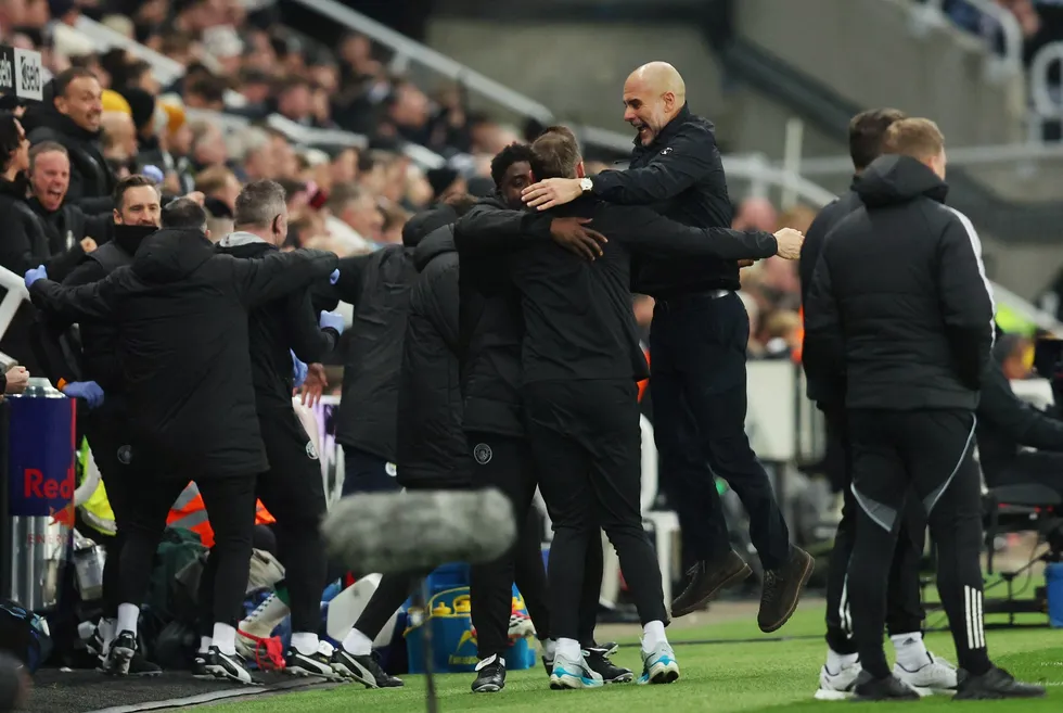 Pep Guardiola, an animated figure all night, celebrated wildly after Man City scored a third