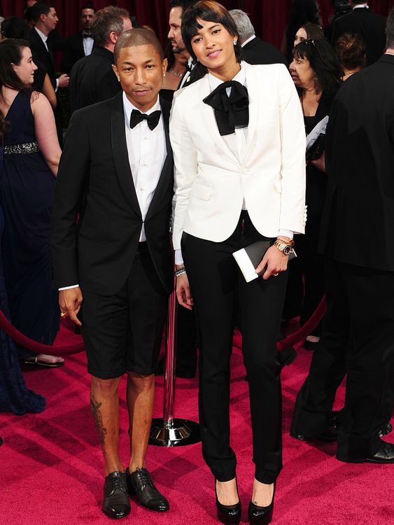 Who says you need to wear trousers to the Oscars? Or socks for that matter. Pharrell Williams with wife Helen Lasichanh in 2014. Pic: Reuters