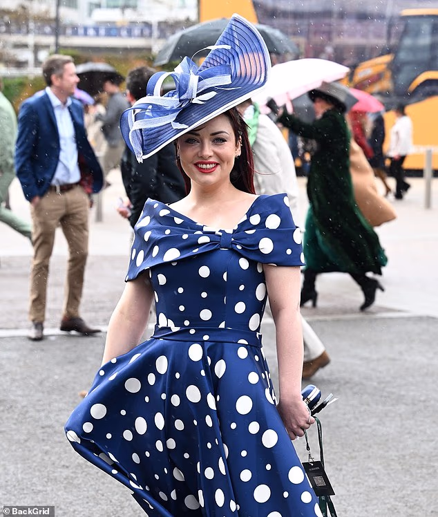 EastEnders and I'm A Celebrity star Shona McGarty was sure to bring the glamour in a bold blue ensemble with a chic complementary fascinator