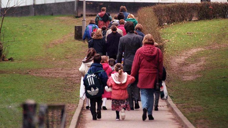 Children returning to Dunblane Primary School for the first time on 22 March 1996 following the shooting. Pic: PA