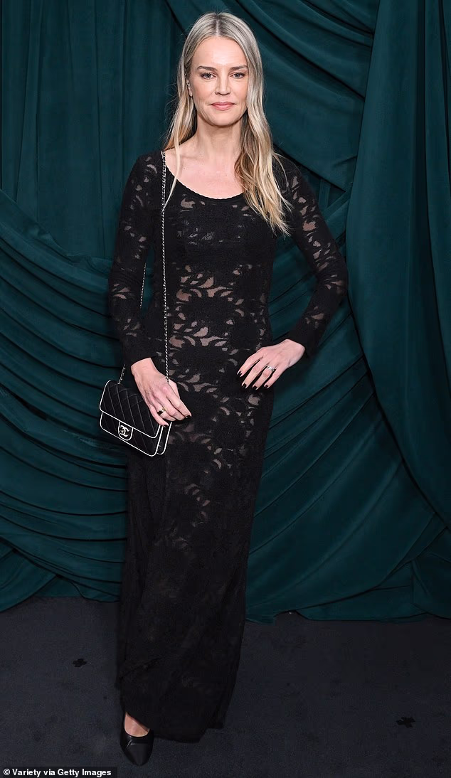 Lauren Santo Domingo was stylish in a semi-sheer, black dress which was paired with black pumps for the special evening