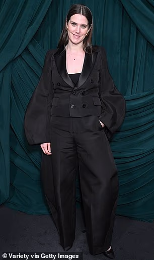 Inga Ibsdotter opted for a cropped, black blazer with billowing sleeves as well as a pair of matching pants that offered a unique flare