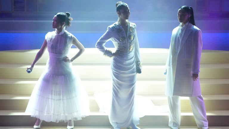 (L-R): Rei Ami, Ejae and Audrey Nuna perform Golden. Pic: AP