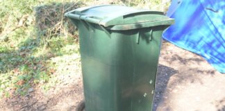 Three arrested after man’s body found in green wheelie bin