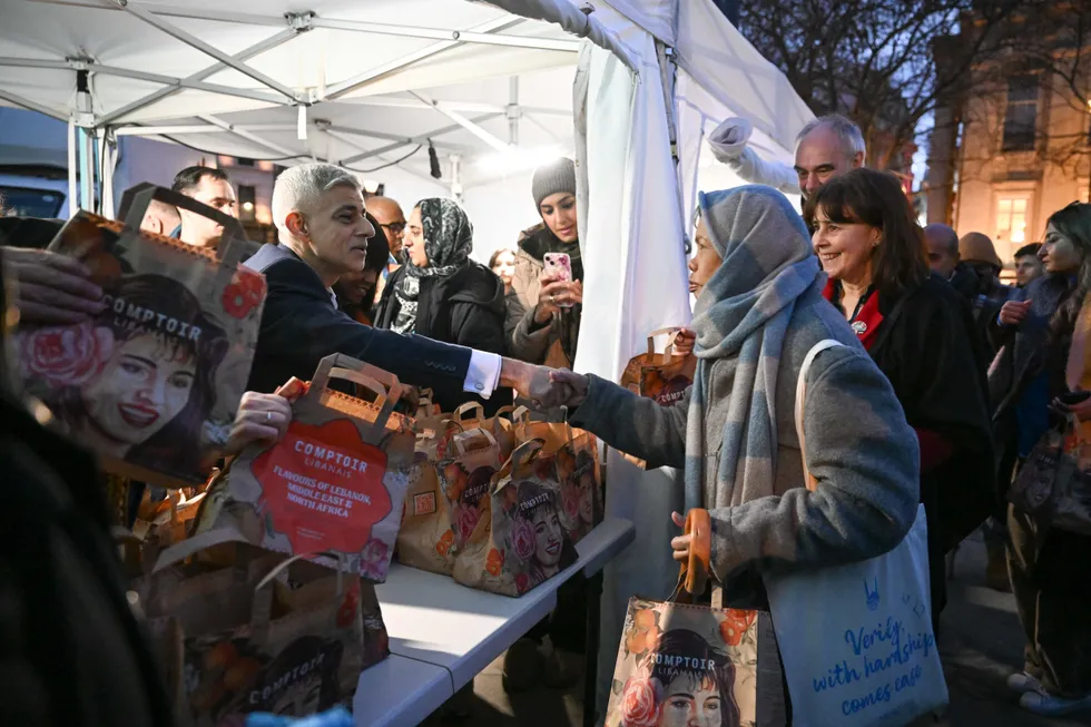 Sir Sadiq handing out meals