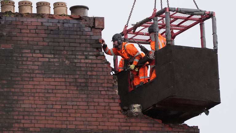 Demolition work is under way following a fire on Union Street, Glasgow. Pic: PA