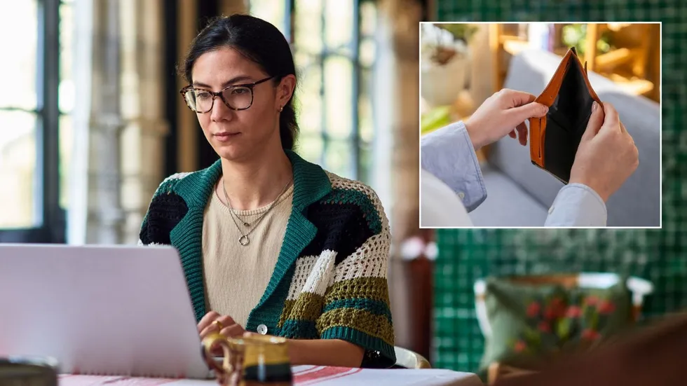 Woman on laptop and empty pursee