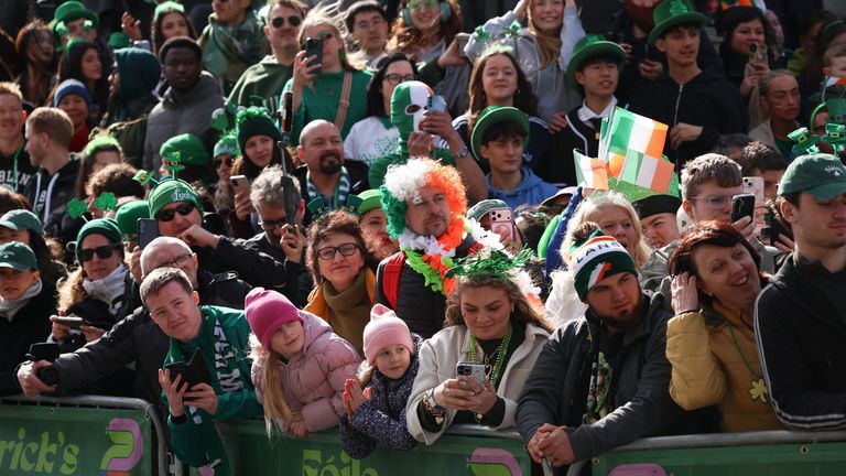 People attend the St Patrick's Day parade in Dublin. Pic: Reuters
