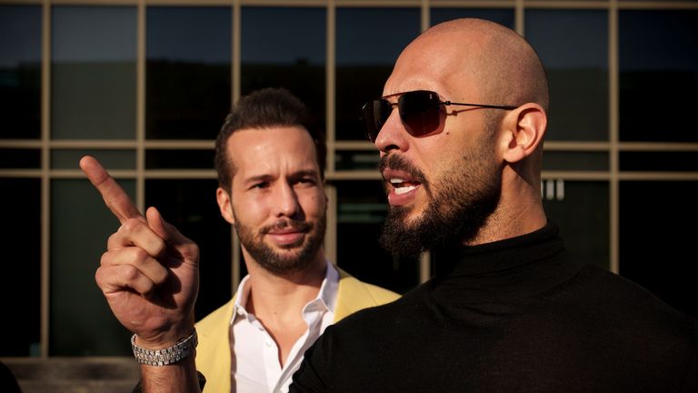 Andrew (R) and Tristan outside the court in Bucharest, Romania, last year. Pic: AP