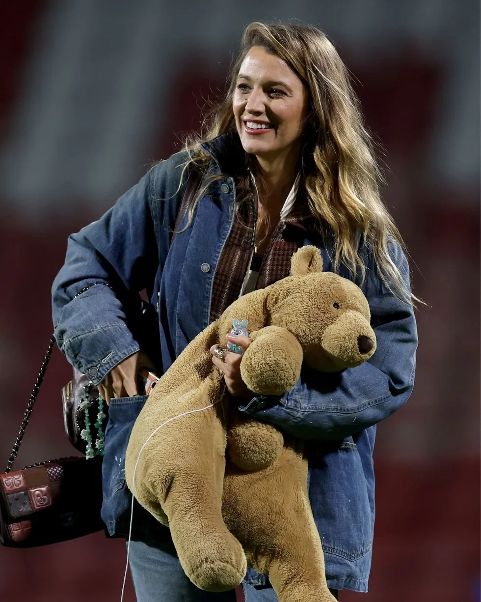 Both Blake Lively and her husband Ryan Reynolds had descended from their private box to meet the players following the 4-2 extra-time defeat