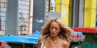 Comfort food! Jackie ‘O’ Henderson’s daughter Kitty collects a takeaway delivery after a visit from best friend Gemma O’Neill amid radio show fallout