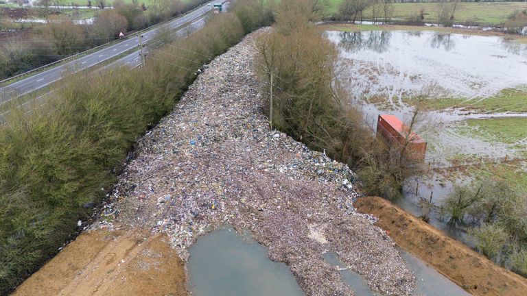 A 150m-long mountain of rubbish illegally dumped near the River Cherwell in Kidlington, Oxfordshire. Pic: PA
