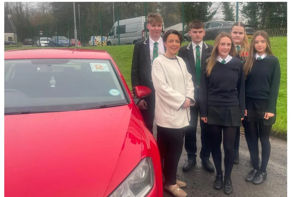 \u200bMinister Liz Kimmins alongside students at Erne Integrated College in Enniskillen, who will be among those learning about Graduated Drivers Licensing