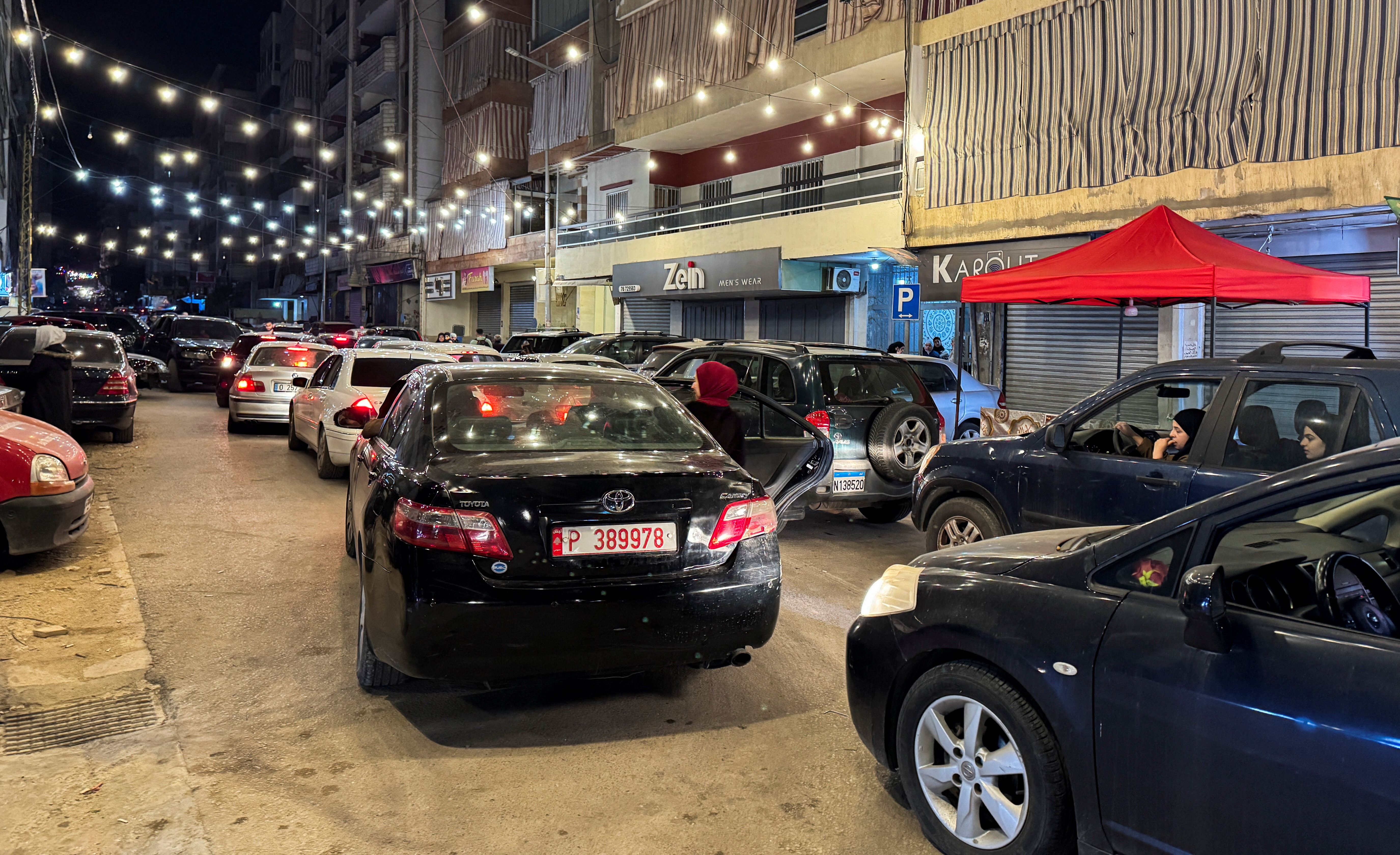 People leave in their cars after Israeli strikes on Beirut's southern suburbs, Lebanon, March 2, 2026. PHOTO: REUTERS