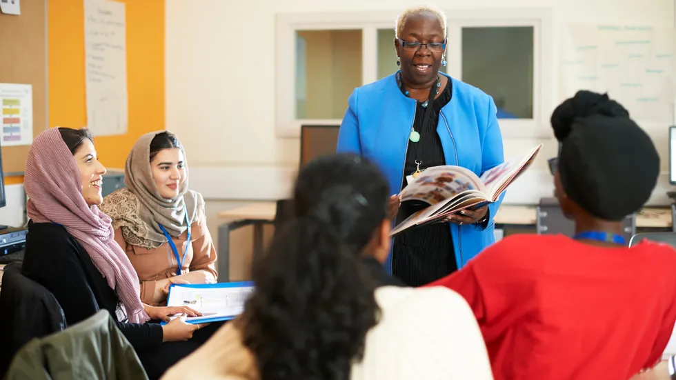 Teacher with Muslim pupils