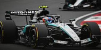 Lewis Hamilton takes the lead during eventful opening lap in China