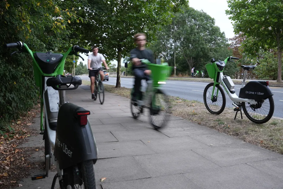 Lime bike on pavement