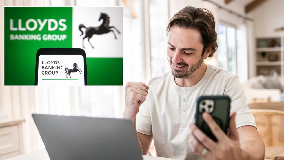 Man on phone and Lloyds Bank app