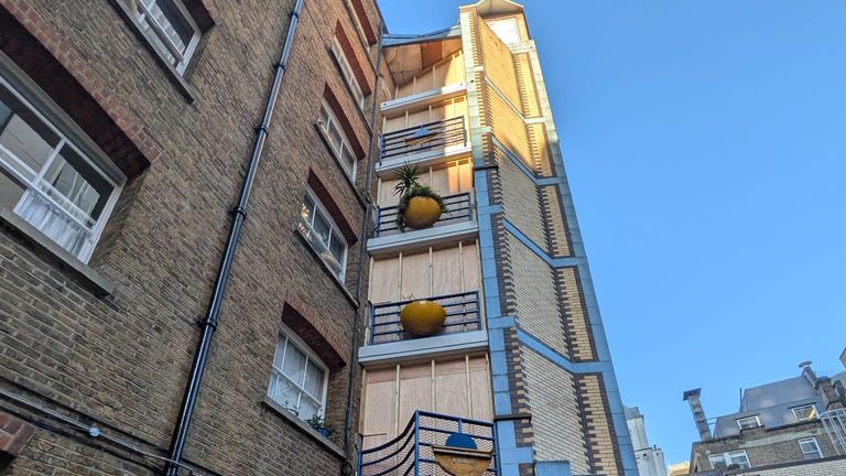 The floor Joshua fell from (top) has been boarded up but is missing its railing. Pic: Fiona Garrett
