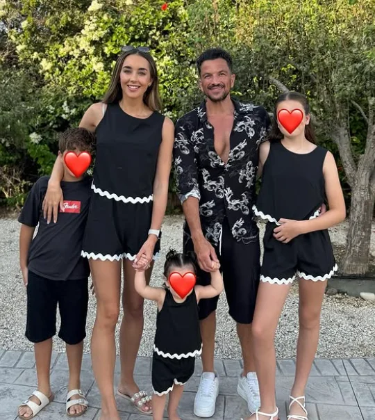 Peter and Emily Andre with their children